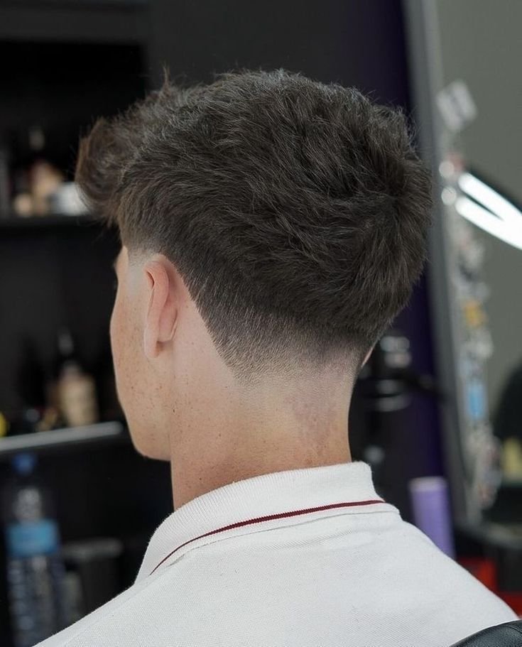 Corte de cabello masculino: Fade Alto y Ajustado