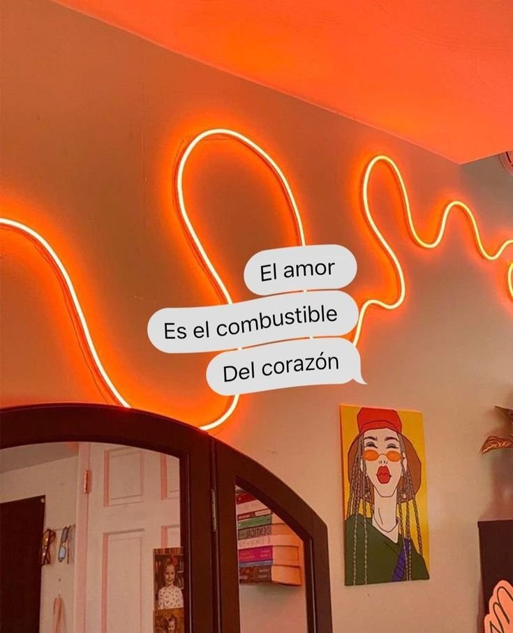 Frase en globos de texto sobre un neón naranja