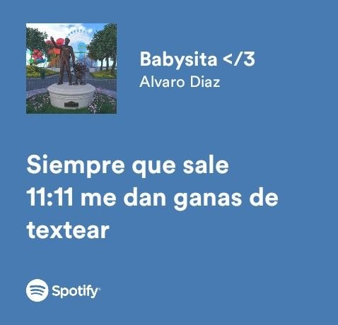 Captura de Spotify con la letra de una canción sobre fondo azul